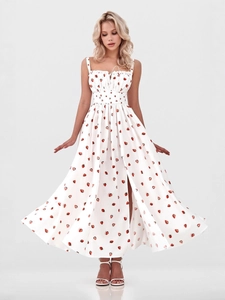 White floral sundress with strawberry print, square neckline, and high side slit
