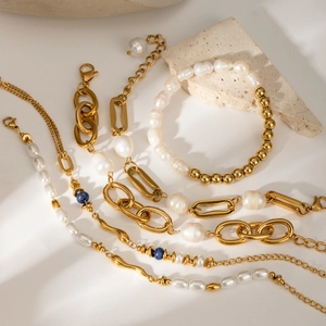 Baroque pearl and 18k gold stainless steel jewelry set with elegant stone accents