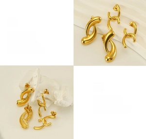 Detailed view of 18k gold plated stainless steel hoop earrings with polished texture