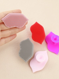 Macro detail of silicone lip brush with suction cup and soft exfoliating massage bristles