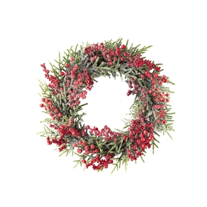 Christmas wreath with red berries and frosted pine needles on white background