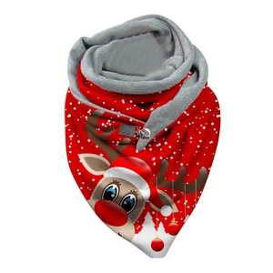 Detail of Christmas scarf with reindeer pattern, red plush fabric and metal button buckle