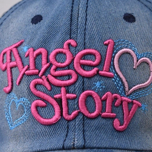 Washed denim baseball cap featuring pink heart and Angel Story embroidery details