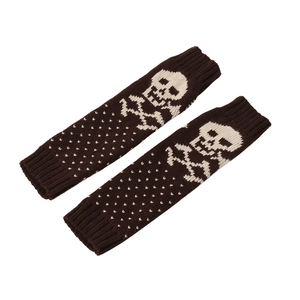 Detail of brown knitted fingerless gloves with white skull pattern and ribbed cuffs