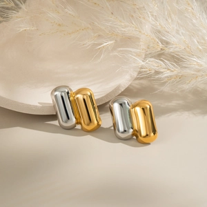 Modern two-tone geometric interlocking link earrings in polished gold and silver finish