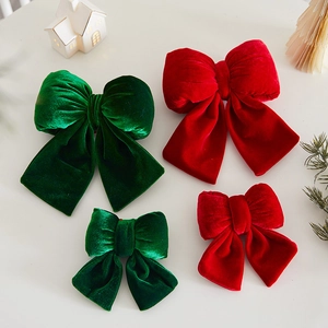 Elegant burgundy and green velvet Christmas bows for tree decoration in multiple sizes