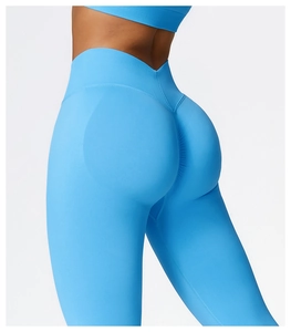 Detail of sky blue seamless yoga pants with high waist and ruched butt-lifting design