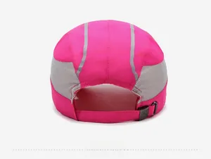 Detail view of quick-dry sports cap with gray mesh side panels and rear reflective strips