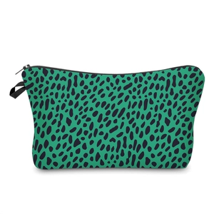 Green and black leopard print fabric makeup bag with zipper on white background