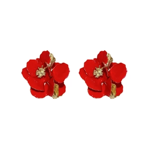 Elegant vintage red flower stud earrings with golden textured stamen on white background