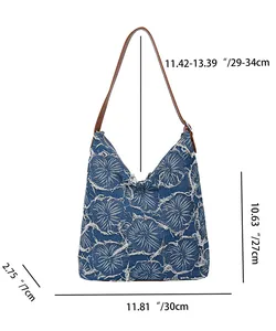 Detailed size measurement chart for the washed denim tote bag showing height and width