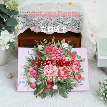 Detailed 3D pop-up Christmas card featuring a pink peony design and Best Wishes text