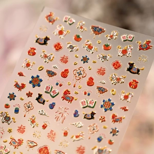 3D embossed nail art stickers with Chinese New Year motifs like lion dance and fortune