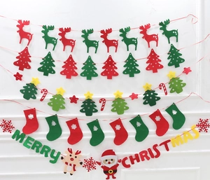 Detailed wall display of Merry Christmas felt banners featuring reindeer and trees