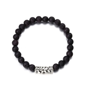 Lava stone bead bracelet with crown charm and textured volcanic beads on white background