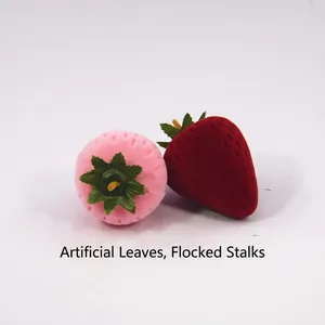 Pink and dark red strawberry shaped flocked jewelry boxes with realistic green leaves