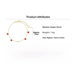 Detail view of gold chain bracelet with five round red cubic zirconia stones and sizing