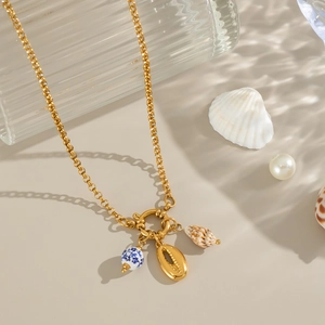 Blue porcelain shell pendant necklace with gold chain and T-bar clasp beach style