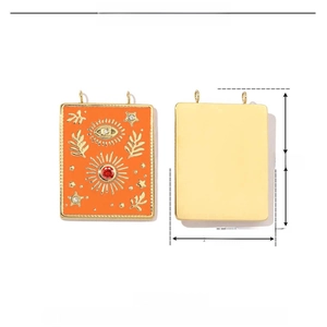Detail of orange enamel rectangle pendant with sun and star inlay and size specs
