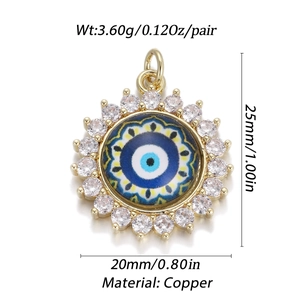 Detalle de colgante ojo turco 20mm con dimensiones y peso 3,6g en cobre con oro