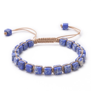 Detail of square blue stone beads on khaki hand-woven bohemian adjustable bracelet