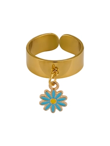 Detail of adjustable gold ring with blue daisy flower charm on white background