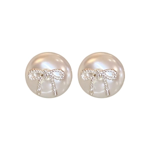 Sweet minimalist pearl stud earrings with textured silver bow decoration for women