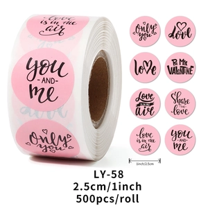 Detail view of 1-inch pink Valentine stickers showing 8 romantic designs and roll specifications