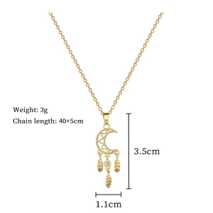Detail view of gold dreamcatcher necklace with dimensions 3.5cm height and 3g weight