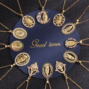 French style gold plated Virgin Mary necklaces with colorful zircon stones on display
