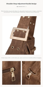 Detail of adjustable wide shoulder strap with vintage gold buckle and metal zipper on brown bag