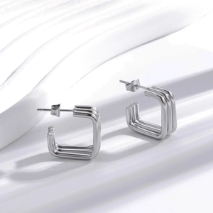 Square triple hoop earrings in silver-toned stainless steel with a geometric design