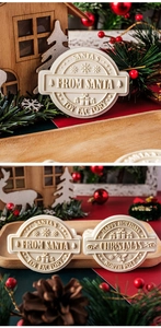 Detail of Christmas badge fondant molds with Santa's toy factory and holiday engravings