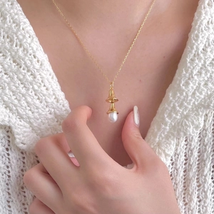 Elegant 925 sterling silver gold chain necklace with a pearl teardrop pendant for women