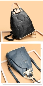 Close-up of stylish contrast color PU leather backpacks in black and blue with gold hardware