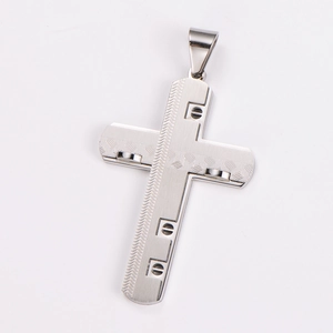 Detailed view of silver stainless steel cross pendant with screw accents on white background