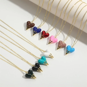 Classic gold heart pendant necklace with colorful enamel charms in various elegant shades