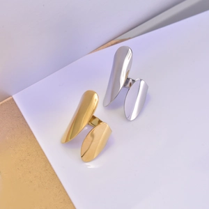 Macro view of gold and silver plated stainless steel rings with high polish finish