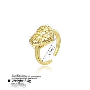 Macro shot of 18k gold plated tree of life heart ring with zircon stones