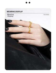 Artistic golden S925 silver ring featuring irregular lava texture worn on index finger