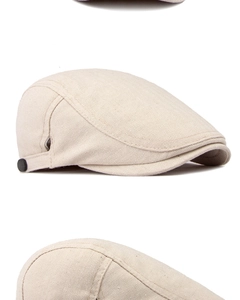 Detailansicht der beige Fischgräten-Schiebermütze mit seitlicher Zierschnalle und Textur
