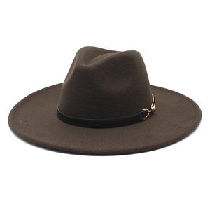 Detail of coffee wool fedora hat featuring black leather band and gold metal buckle