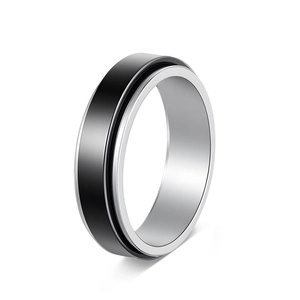 Detail shot of a 6mm stainless steel spinner ring with a silver and black dual-tone finish