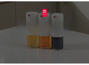 Detail view of durable borosilicate glass dispenser set for oil, sauce, and vinegar