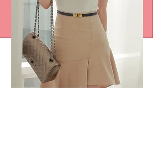 Detail of slim black leather belt with gold buckle on a khaki skirt for styling