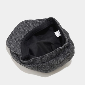 Classic men's herringbone newsboy cap in grey and black with soft inner lining
