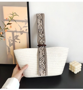 Detailed woven cotton tote with paisley strap attached via a dark wooden ring detail