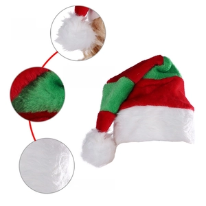 Detail showing plush texture and red-green stripe seams of the Christmas hat