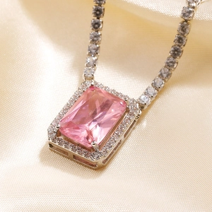Luxury rectangular pink zircon pendant necklace with silver chain on silk fabric