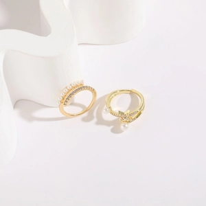 Elegant 14K gold plated rings set with linear pearls and sparkling geometric star design